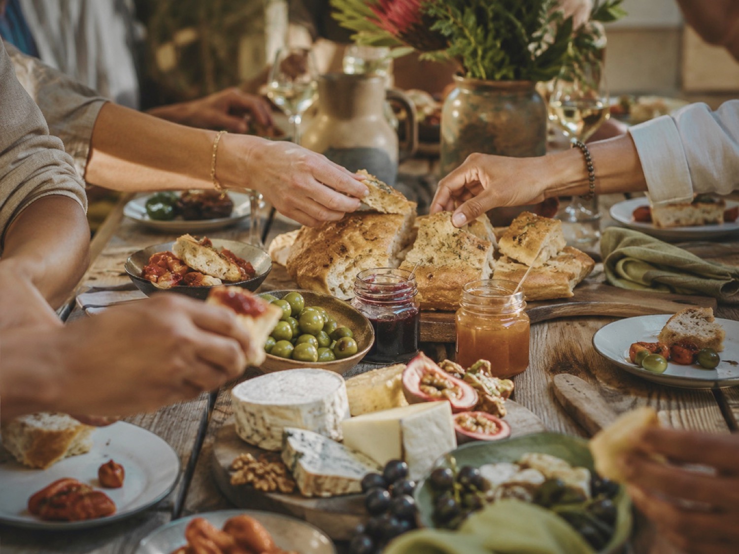 Friends sharing food around a table